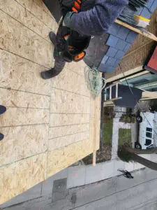 Right Choice Roofing and Repair installing new plywood sheeting to replace rotted wood boards on a Toronto slope roof.
