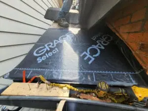 Progress photo showing Grace Select ice and water shield being installed on new roof deck during slate roof replacement in Harbord Village Toronto by Right Choice Roofing and Repair