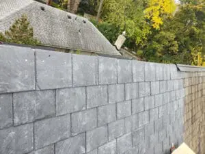 Completed natural Slate Roof along the full length of a Ridge on a Rosedale Toronto heritage home with finished copper Ridge Cap and vent caps by Right Choice Roofing and Repair