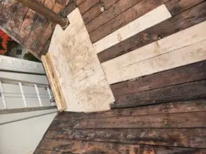 Repaired Roof structure with new patched board Sheathing on a Rosedale Toronto heritage Roof, ready for new plywood installation