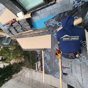 Right Choice Roofing and Repair technician replacing a flat and slate roof in Toronto using Grace Select waterproofing underlayment.
