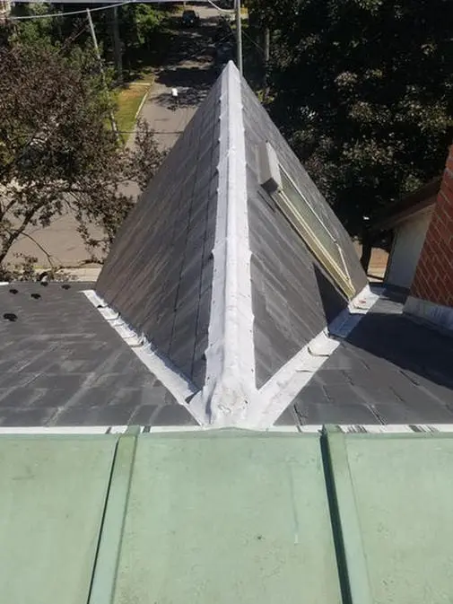Before photo of slate roof replacement on dormer in Harbord Village Toronto showing deteriorated slate tiles prior to removal by Right Choice Roofing and Repair