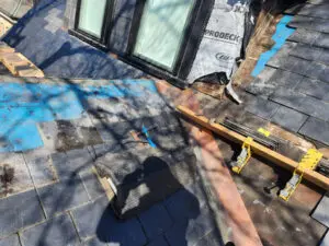 Professional engineered staging and ladder system installed by Right Choice Roofing and Repair on a steep Toronto slate roof.