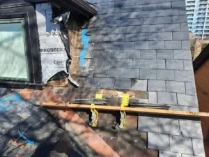 Large-scale slate tile removal and professional staging by Right Choice Roofing and Repair for a Toronto roof restoration project.