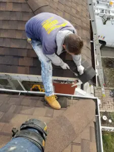 Expert local Toronto roofer installing new Shingles in Bloor West Village during wildlife damage repair by Right Choice Roofing and Repair