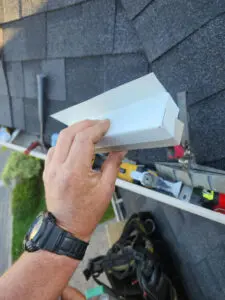 Custom fabricated metal flashing piece for wildlife roof repair in Toronto