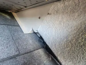 Reinforced roof penetration during a multi-layer repair in Toronto
